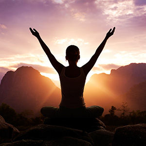 Woman meditating in nature