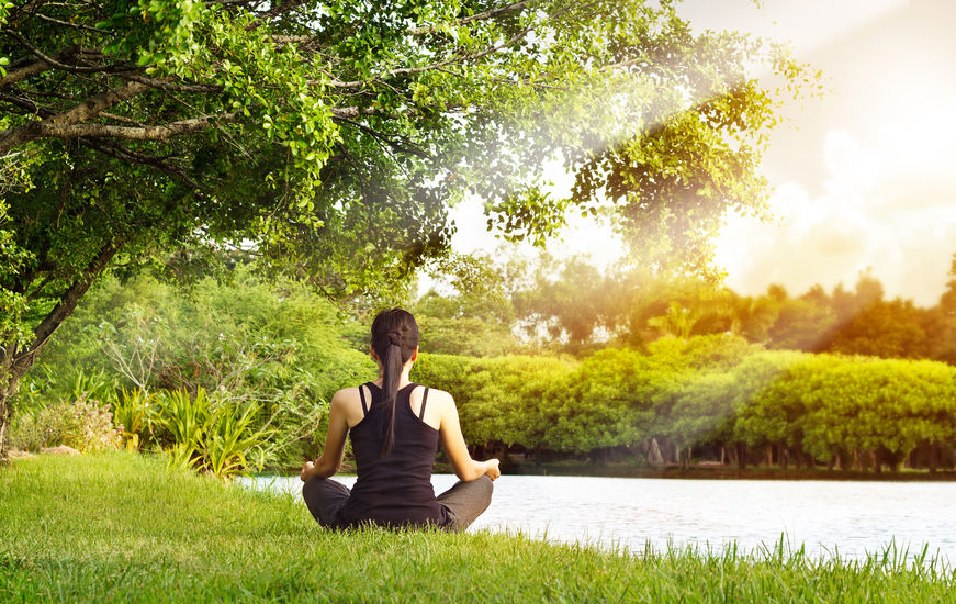 Woman meditating in nature
